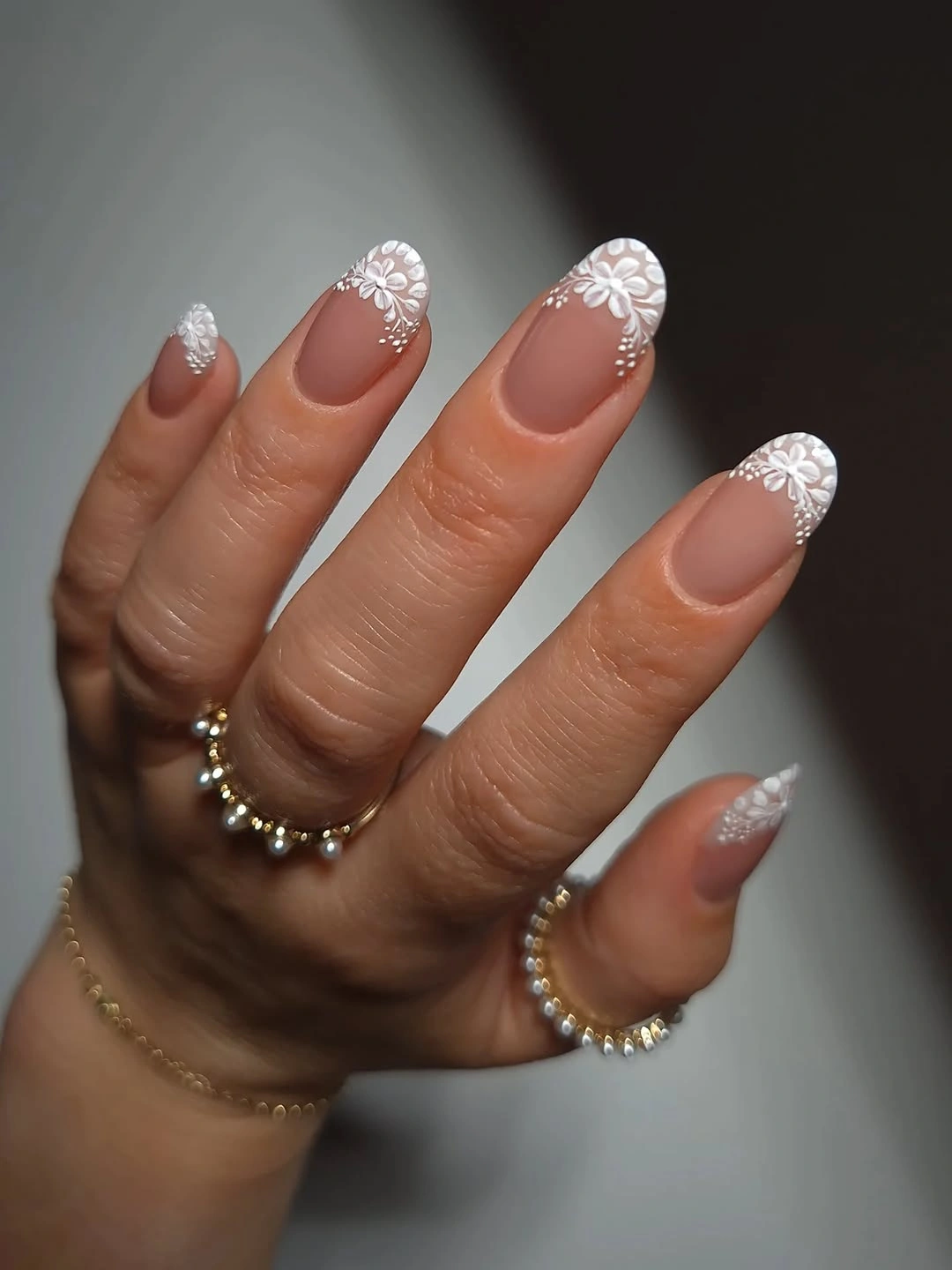 fall wedding nails 2026 Delicate White Floral Tips For A Romantic Bride