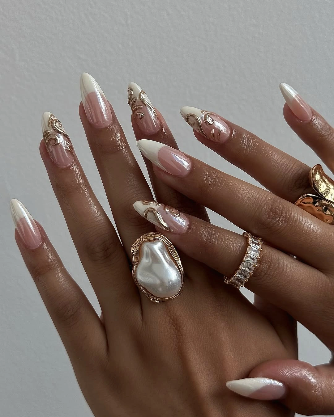 fall wedding nails 2026 Elegant French Tips With Golden Swirls