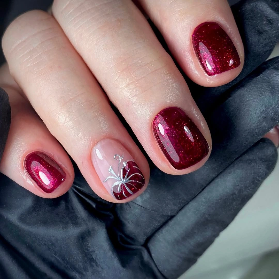 halloween nail art 2026 Ruby Shimmer With a Silver Spider