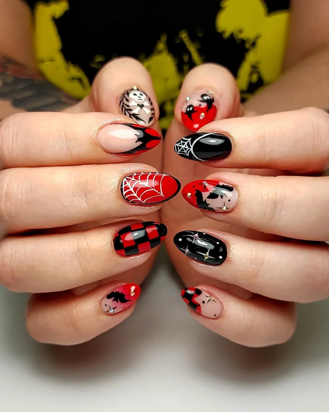 halloween nails designs 2026 Black and Red Spiderweb Mix