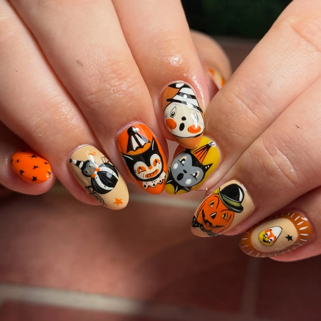 halloween nails designs 2026 Orange Halloween Character Nails
