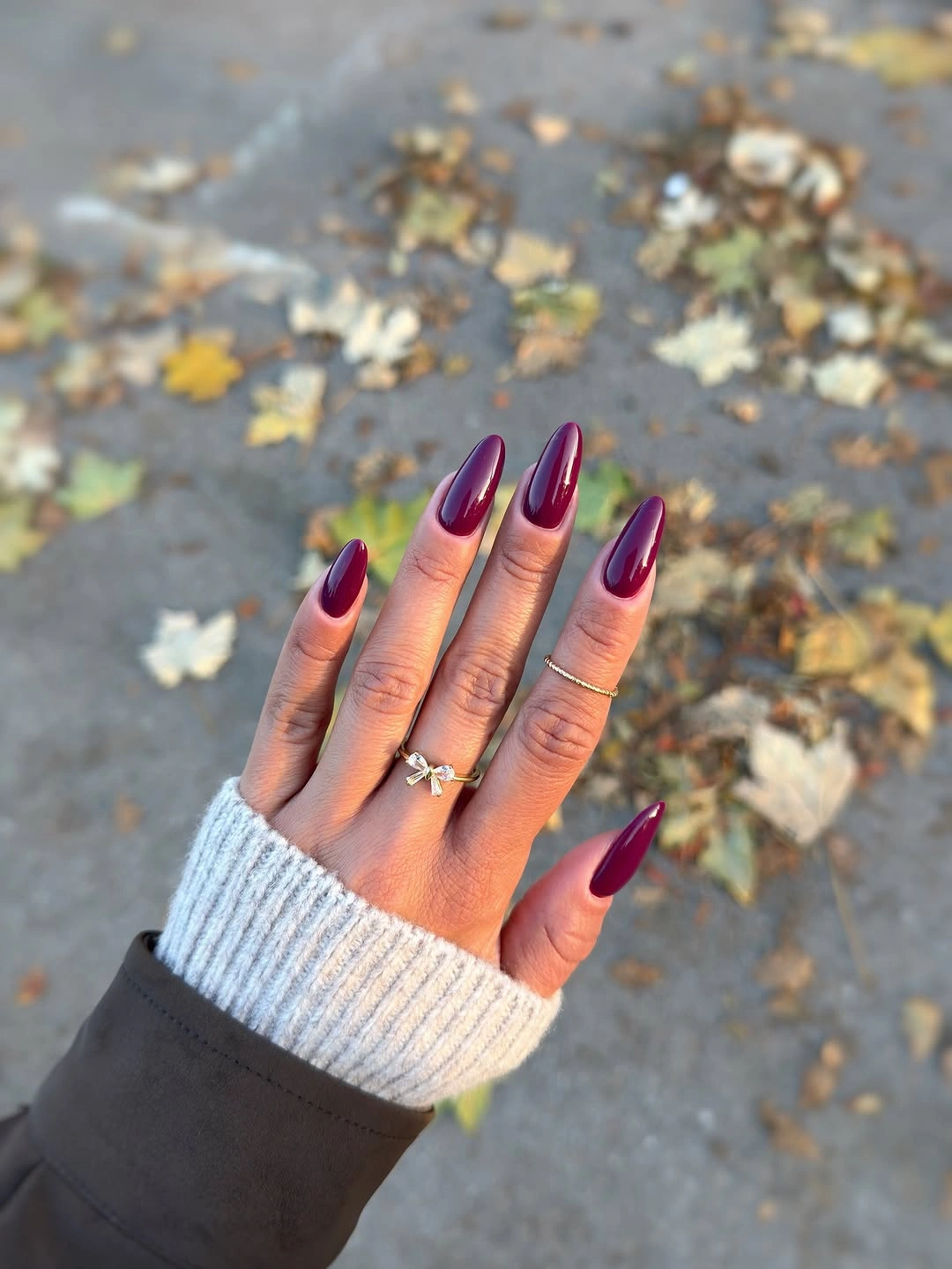 maroon fall nails 2026 Classic Glossy Burgundy Almond Nails