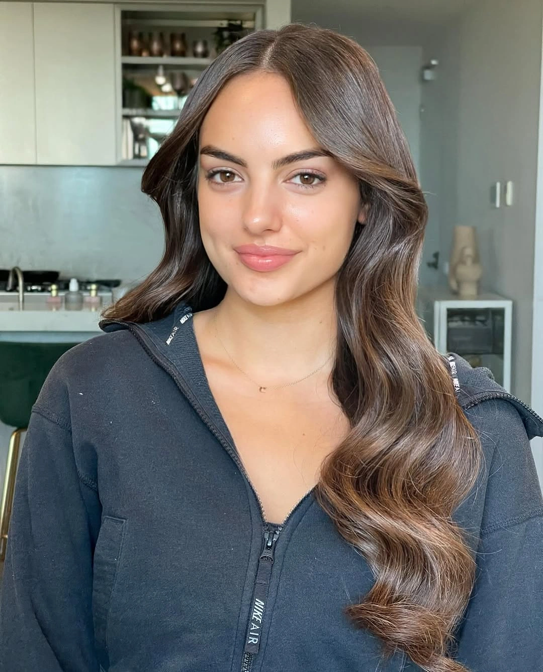 middle parting hairstyles Glossy Long Waves With A Soft Center Part