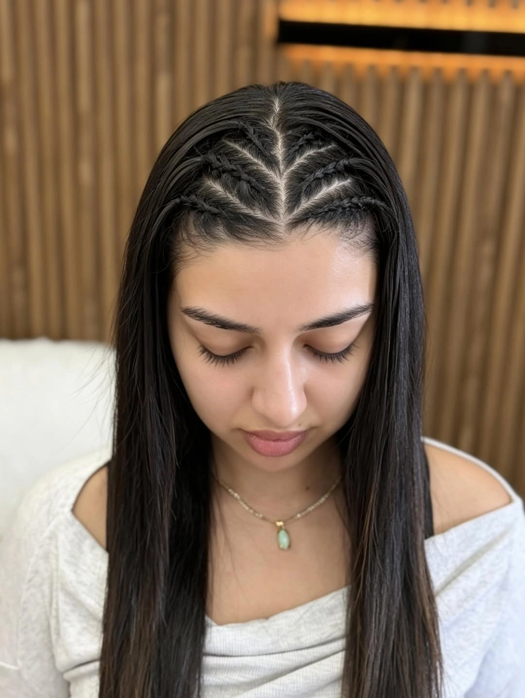 middle parting hairstyles Intricate Braided Middle Part With Sleek Lengths