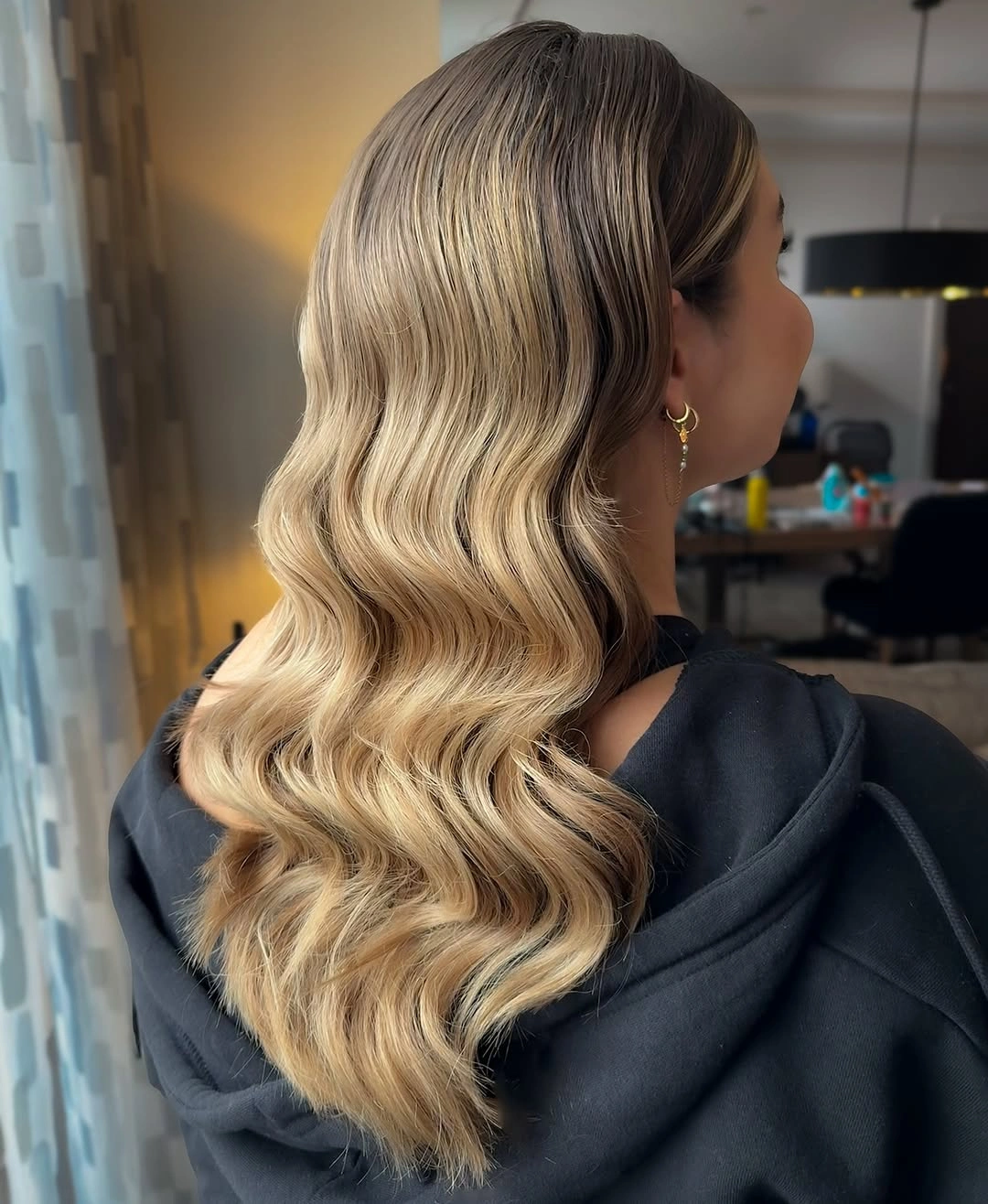 middle parting hairstyles Soft Blonde Waves With A Subtle Middle Part