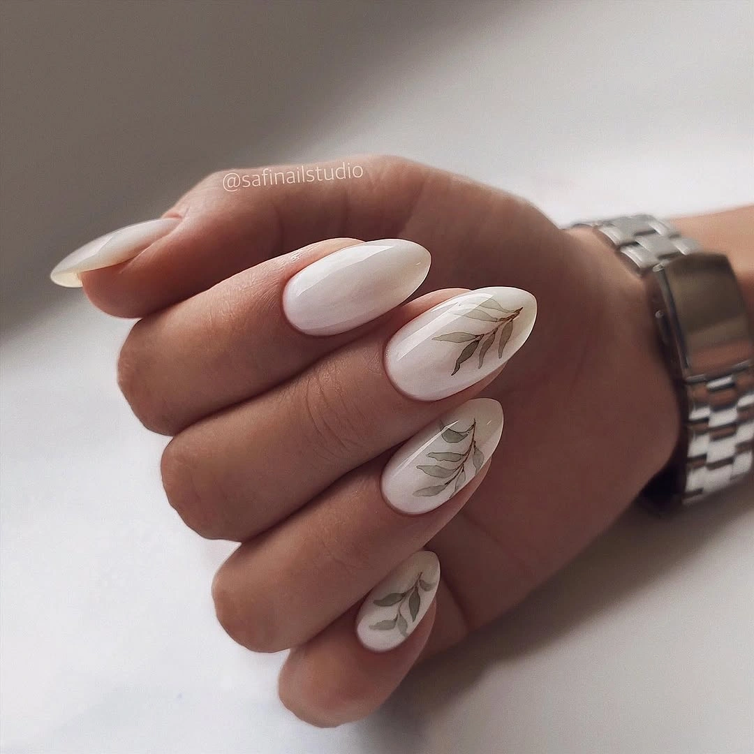 nude fall nails 2026 Milky Almond Nails With Delicate Leaves