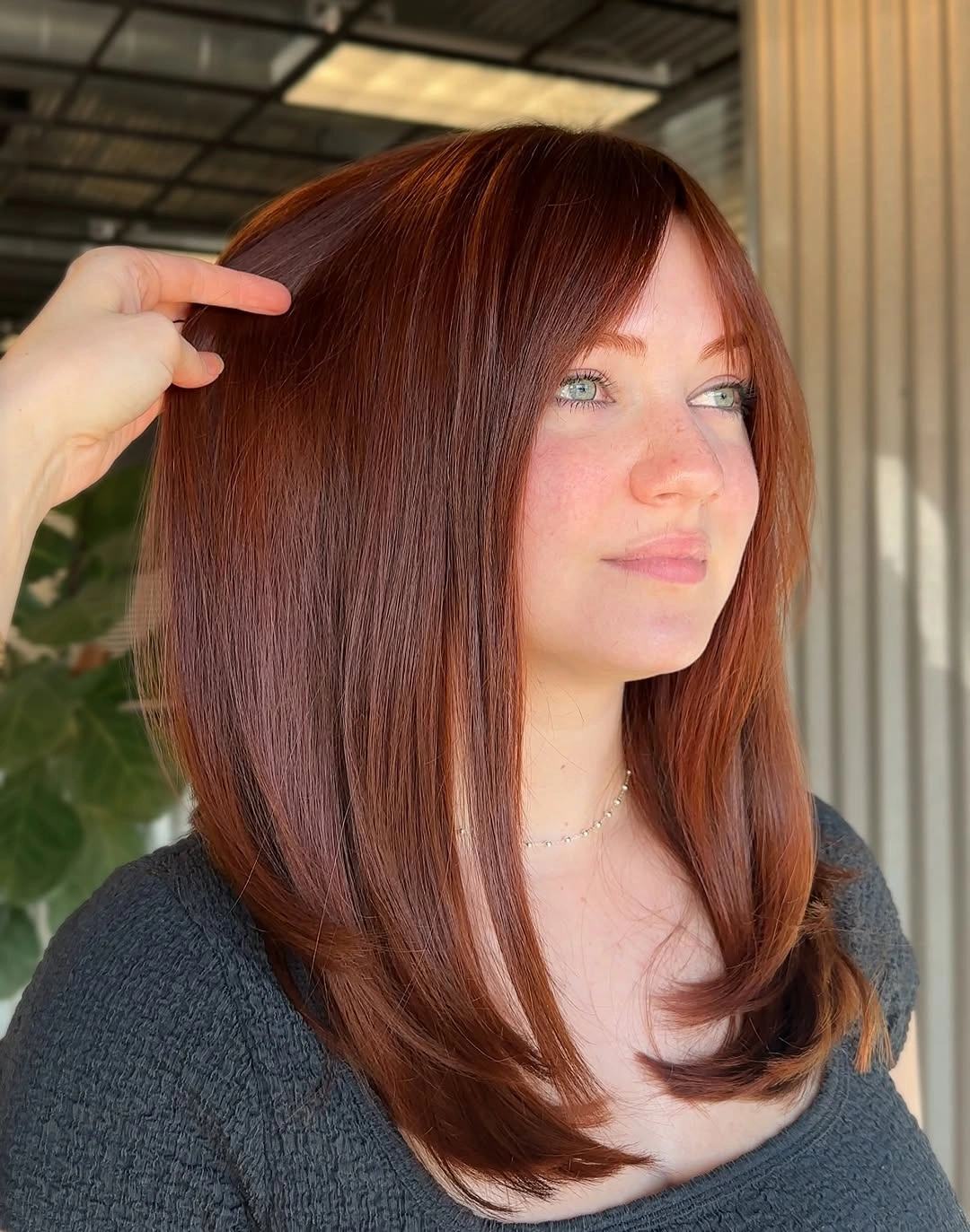october haircut ideas 2026 Sleek Copper Cut With Curtain Bangs