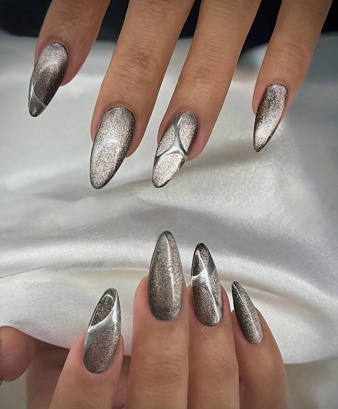 october nails design 2026 Silver Cat Eye Almond Nails