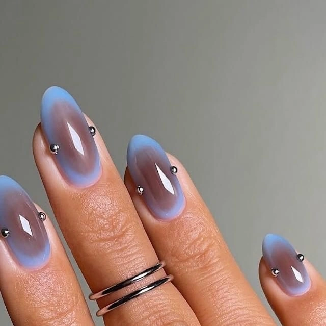 october nails design 2026 Smoky Blue Aura Almond Nails