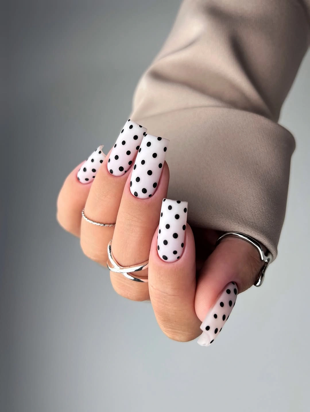 polka dot fall nails 2026 Graphic Black Dots on Milky White