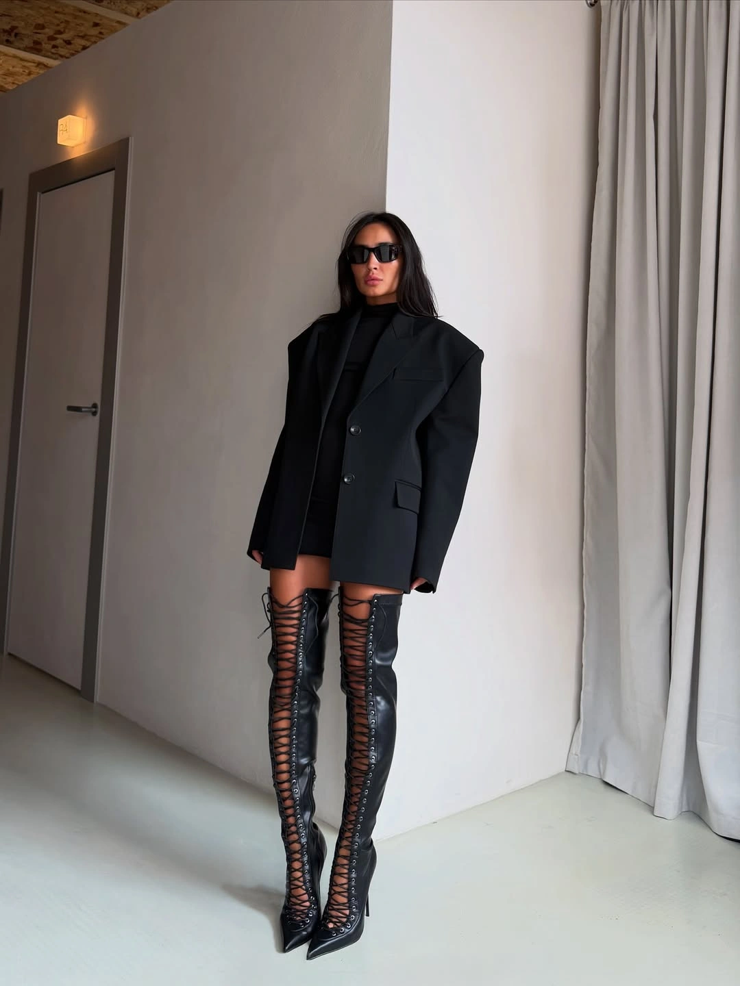 september fashion trends 2026 Black Blazer Lace Up Boots Outfit