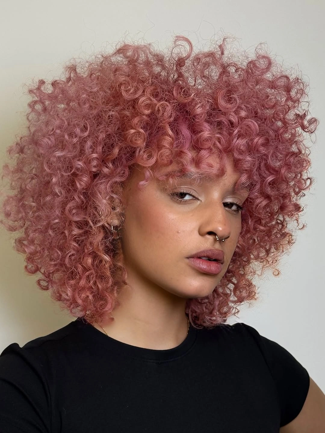 september hair colour trends 2026 Dusty Rose Curls For A Playful Autumn Mood