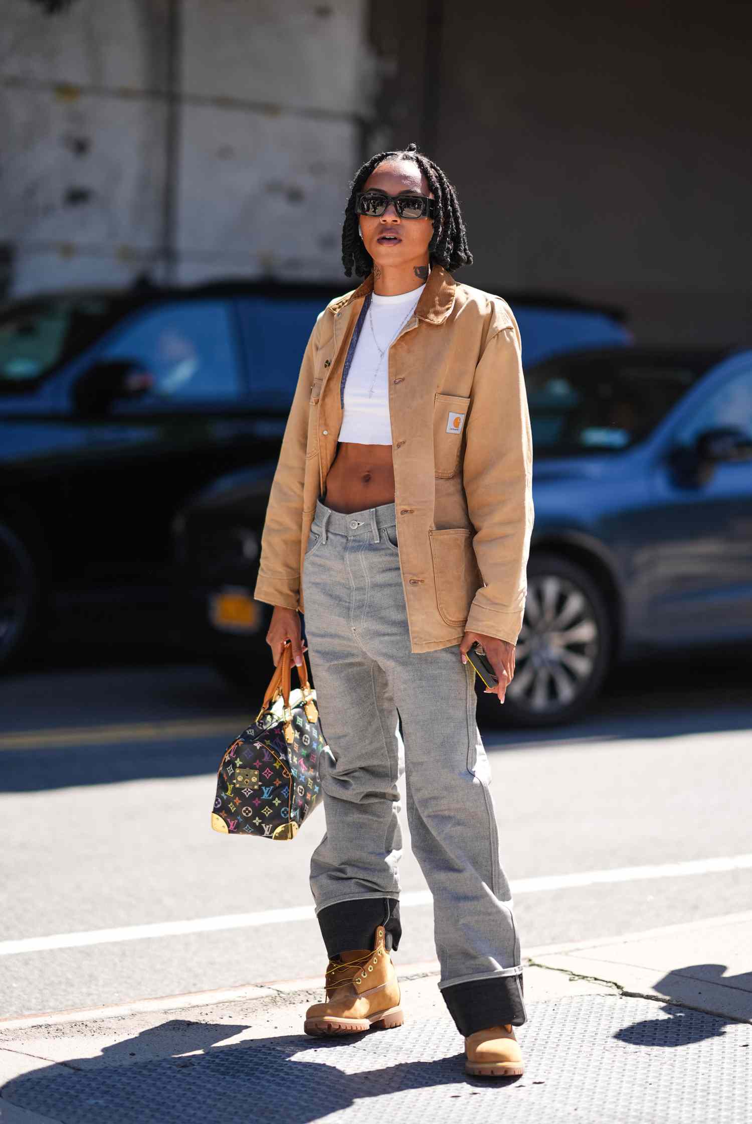 Workwear Jacket Layered Over Crop Top with Timberland Boots Workwear Jacket Layered Over Crop Top with Timberland Boots — Timberland Boots Outfits