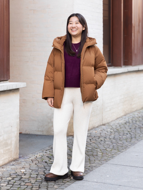 Brown Hooded Puffer Jacket Over Purple Sweater and Knit Pants — Parka Outfits
