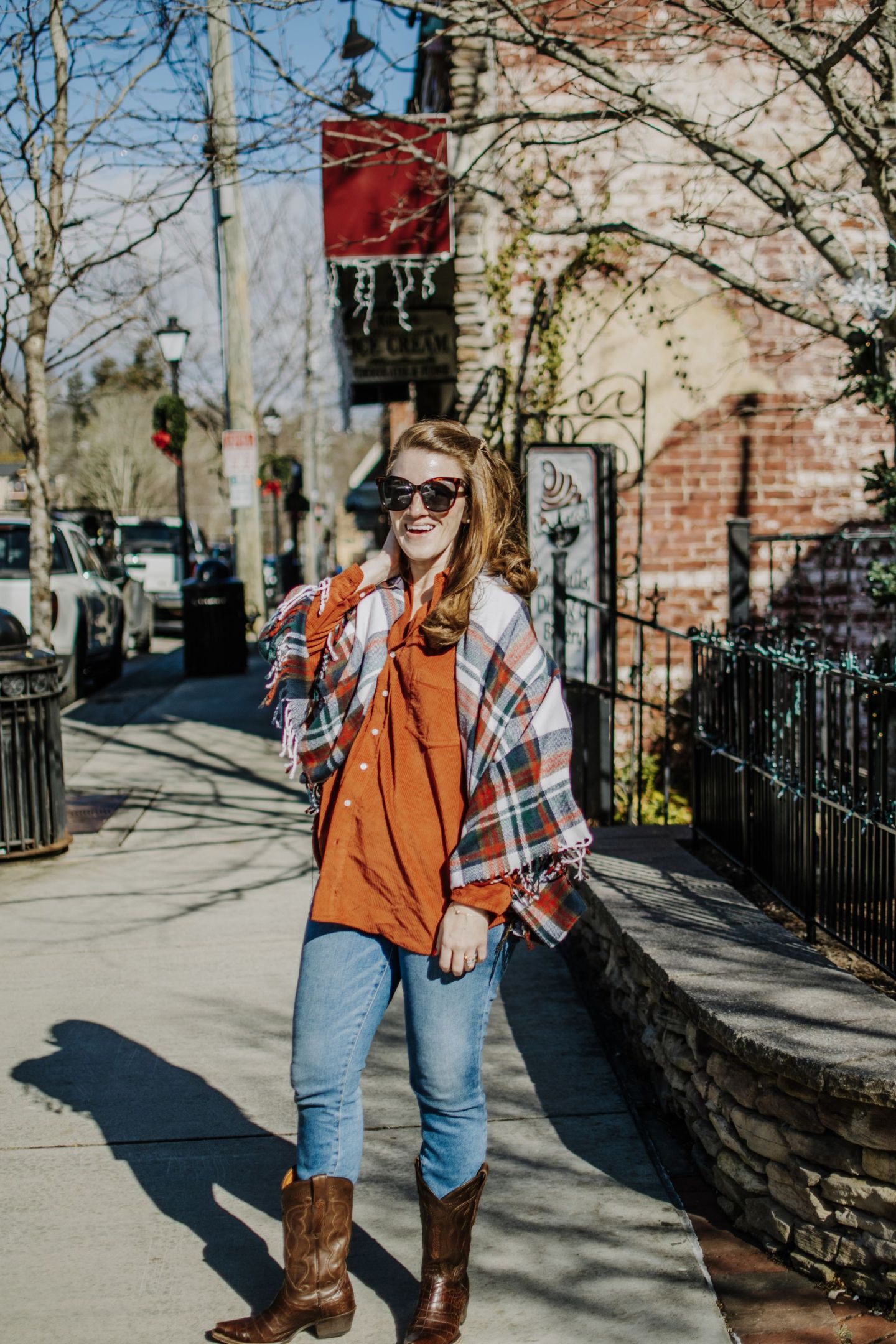 Vibrant Scarf with Cowboy Boots and Jeans — Nashville Winter Outfits
