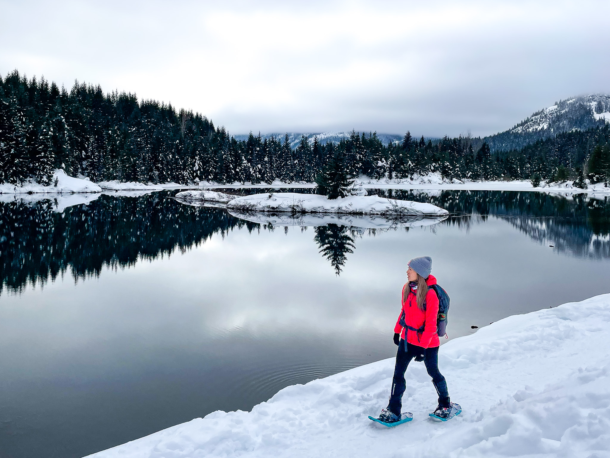 Red Puffer Jacket and Snowshoes for Snowy Paths Red Puffer Jacket and Snowshoes for Snowy Paths — Winter Hiking Outfits
