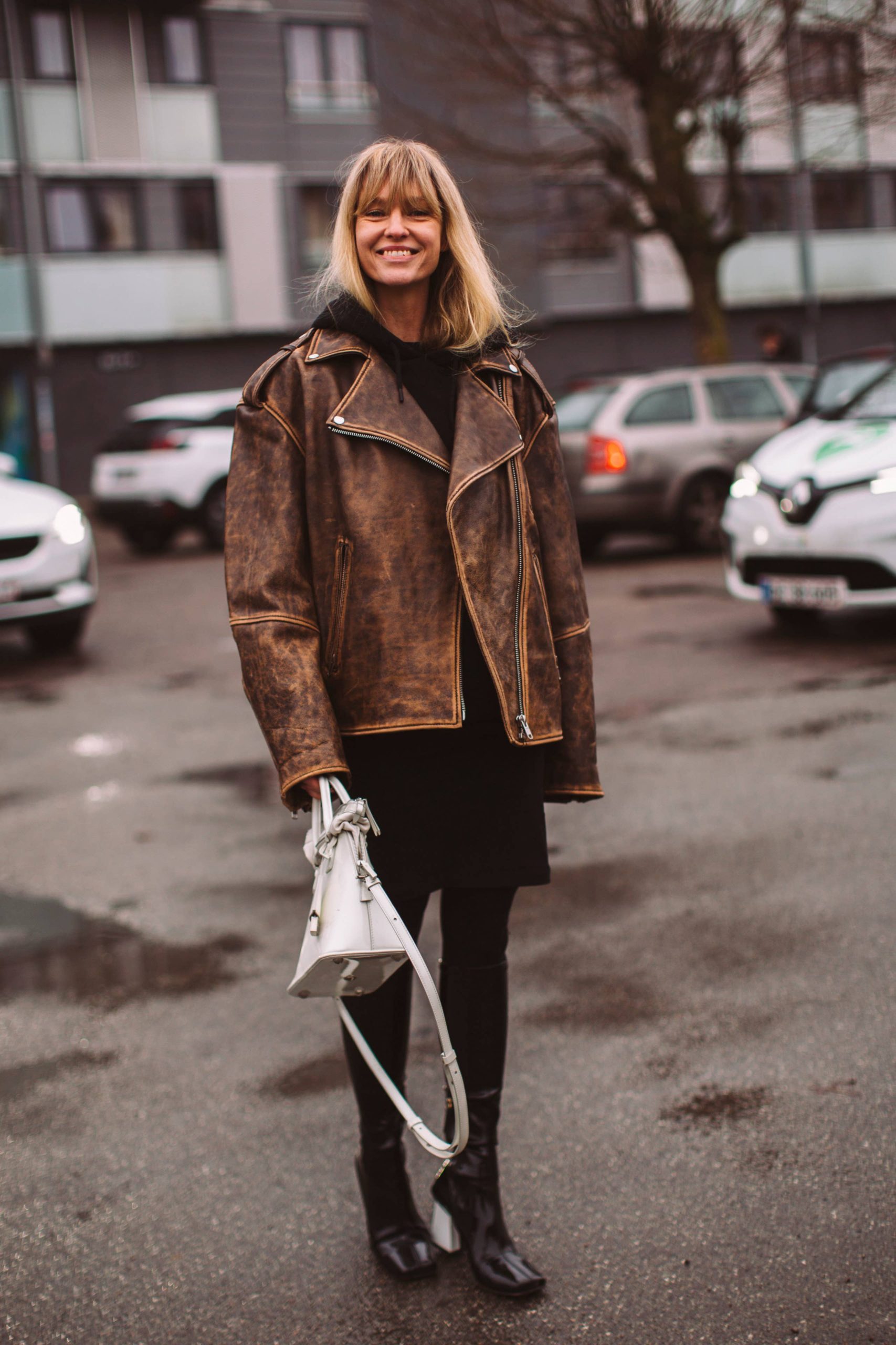 Distressed Leather Jacket with Black Dress: Edgy Scandinavian Winter — Scandinavian Winter Outfits