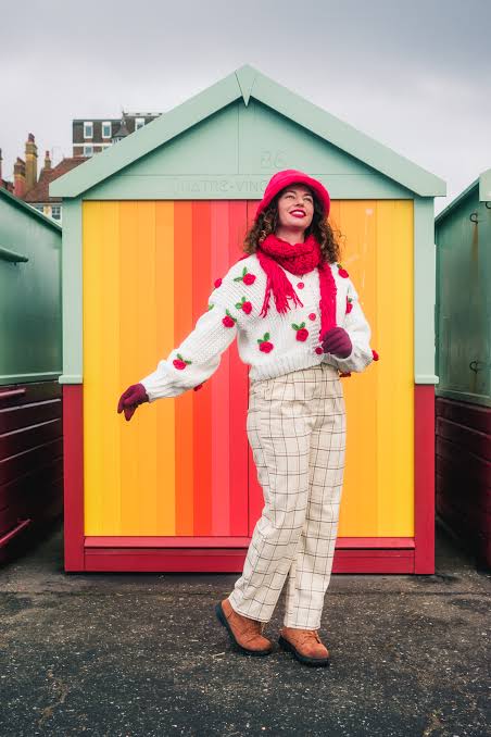 White Cherry Print Sweater with Cream Plaid Pants and Red Accessories — Colorful Winter Outfits