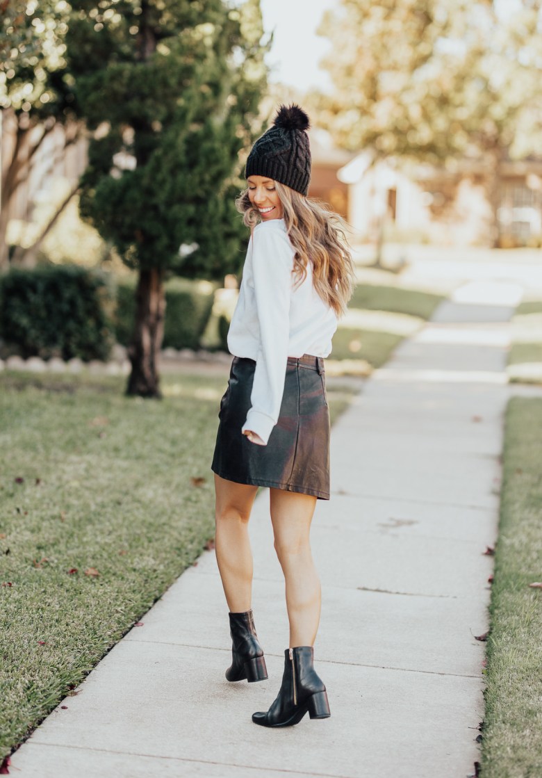 Playful Texture: Black Block Heels with a Leather Mini Skirt Playful Texture: Black Block Heels with a Leather Mini Skirt — Black Boots Outfits