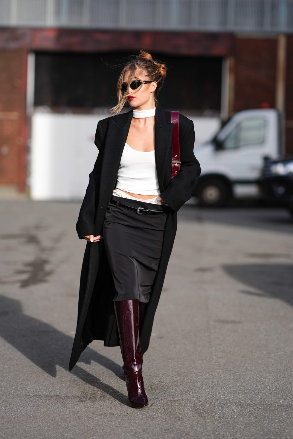 Long Black Coat with Satin Skirt and Knee-High Boots for Evening — Late Winter Outfits