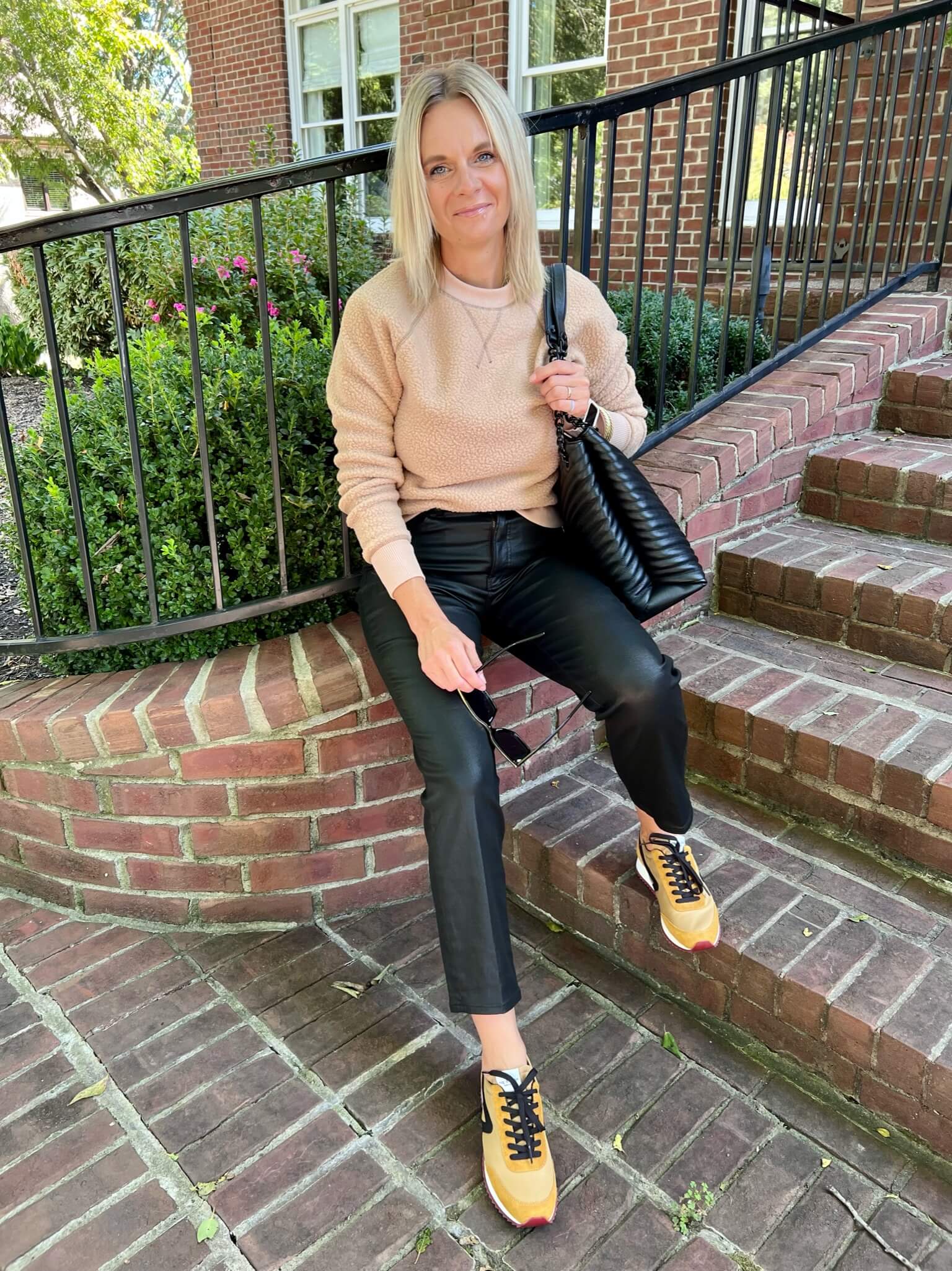 Casual Weekend: Leather Pants with Fleece Sweatshirt and Bold Sneakers — Leather Pants Outfits