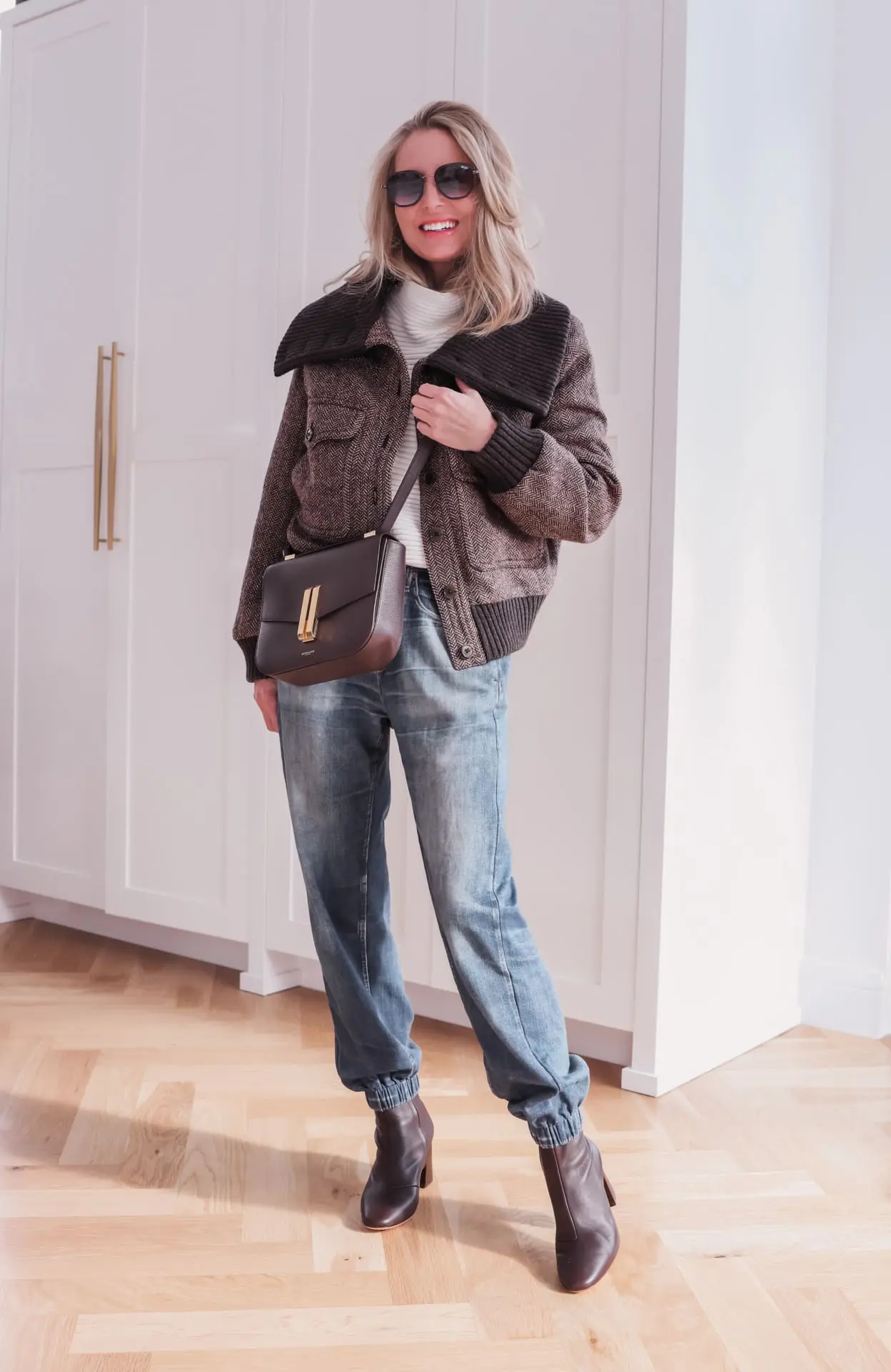 Textured Bomber Jacket with Turtleneck and Cuffed Jeans — Winter Brunch Outfits
