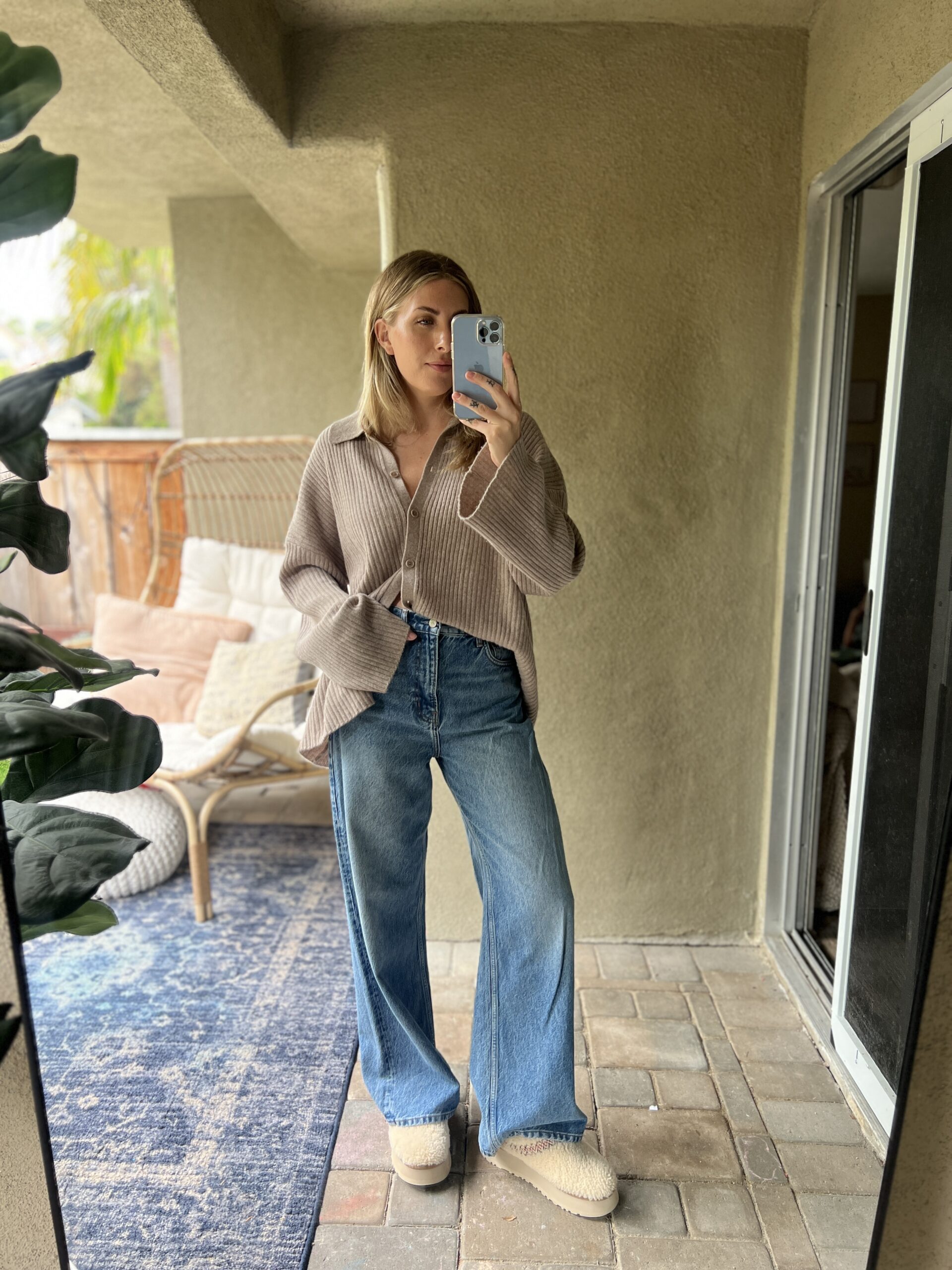 Ribbed Knit Cardigan and Wide-Leg Jeans with Cream Slippers — Ugg Slippers Outfits