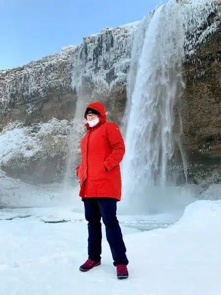 Bold Red Parka for Winter Sightseeing — Iceland Winter Outfits