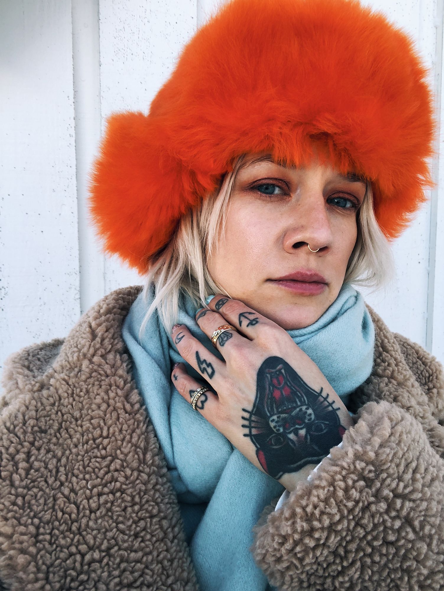 Teddy Coat with Orange Faux Fur Hat: Cozy and Bold Winter Layers — Scandinavian Winter Outfits