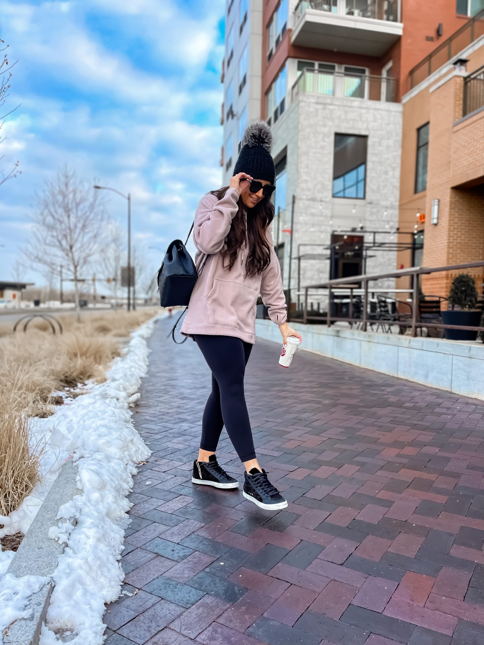 Oversized Hoodie with Beanie and Backpack for Travel — Winter Athleisure Outfits
