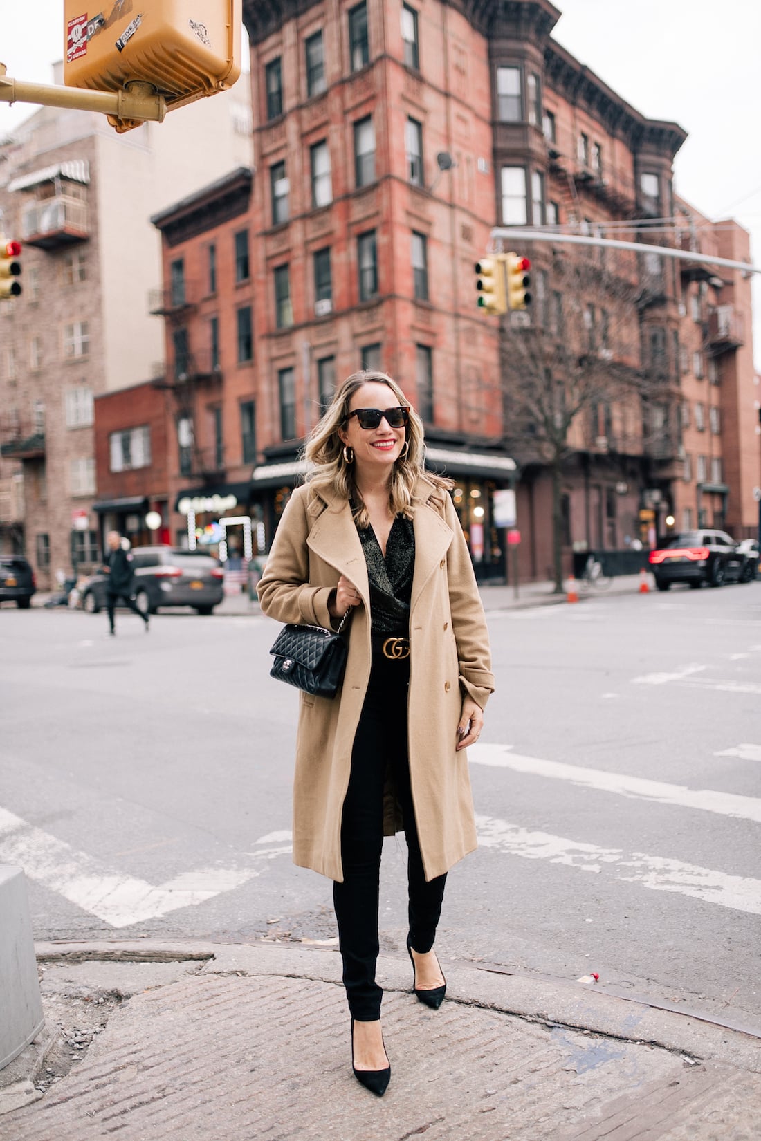 Camel Wool Coat Over Black Patterned Top and Trousers — Winter Date Night Outfits