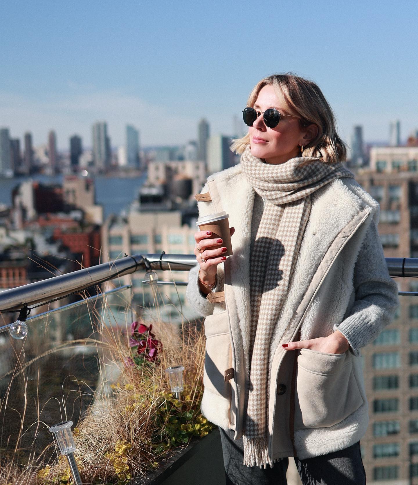 Shearling Vest Over Knit Sweater with Scarf Accent — Winter Teacher Outfits