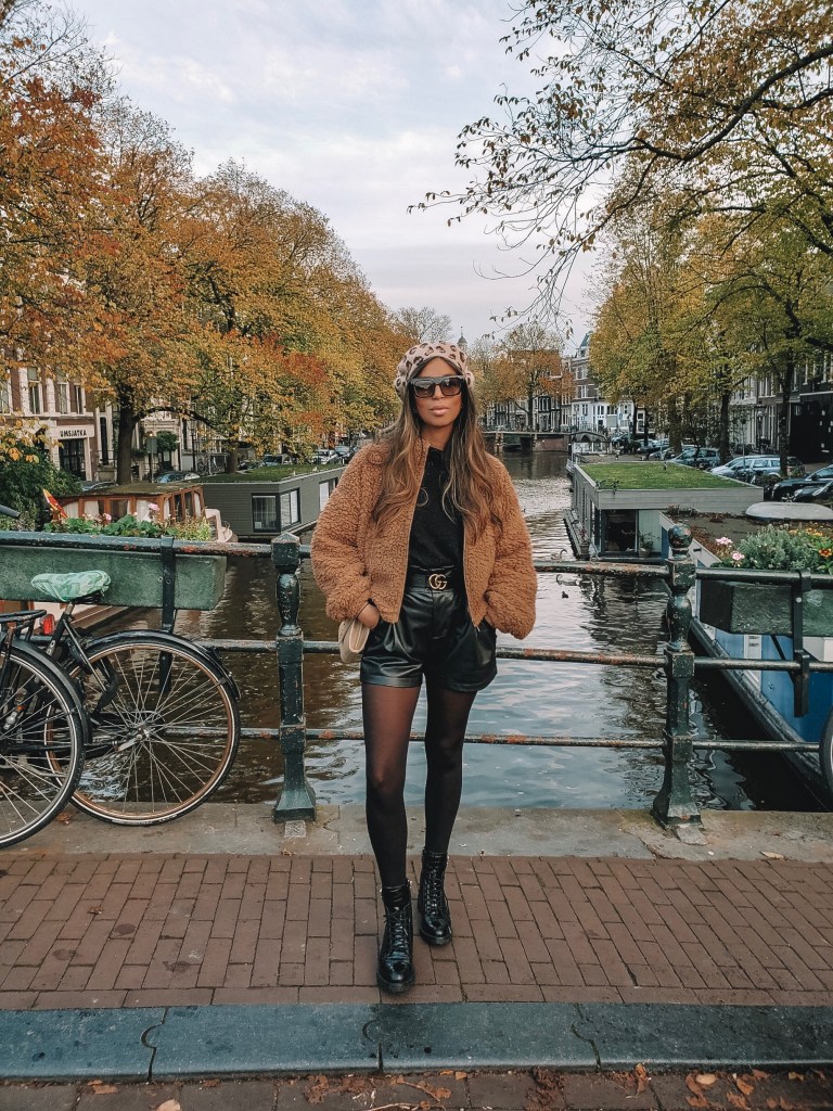 Edgy Fall Look with Teddy Jacket, Faux Leather Shorts, and Combat Boots — Fall to Winter Outfits