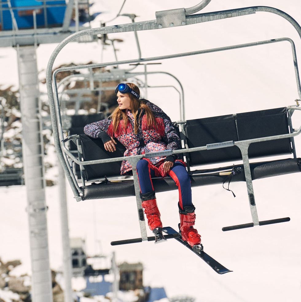 Playful Floral Ski Jacket with Red Ski Boots — Apres Ski Outfits