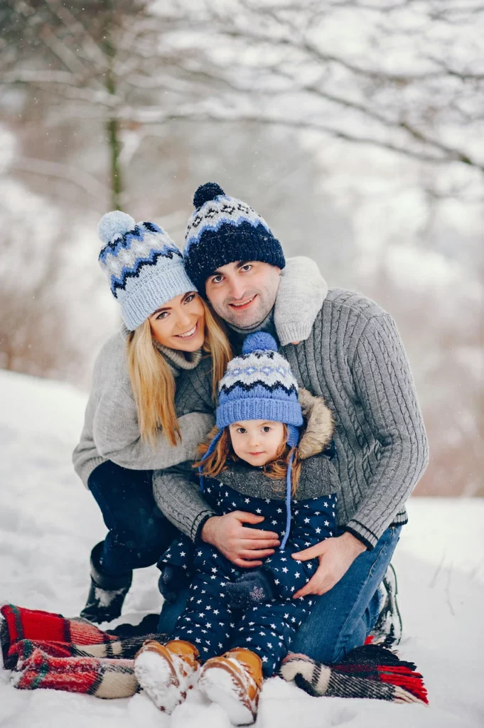 Coordinated Patterned Beanies and Jumpsuits for a Playful Family Photo Coordinated Patterned Beanies and Jumpsuits for a Playful Family Photo — Winter Family Photo Outfits