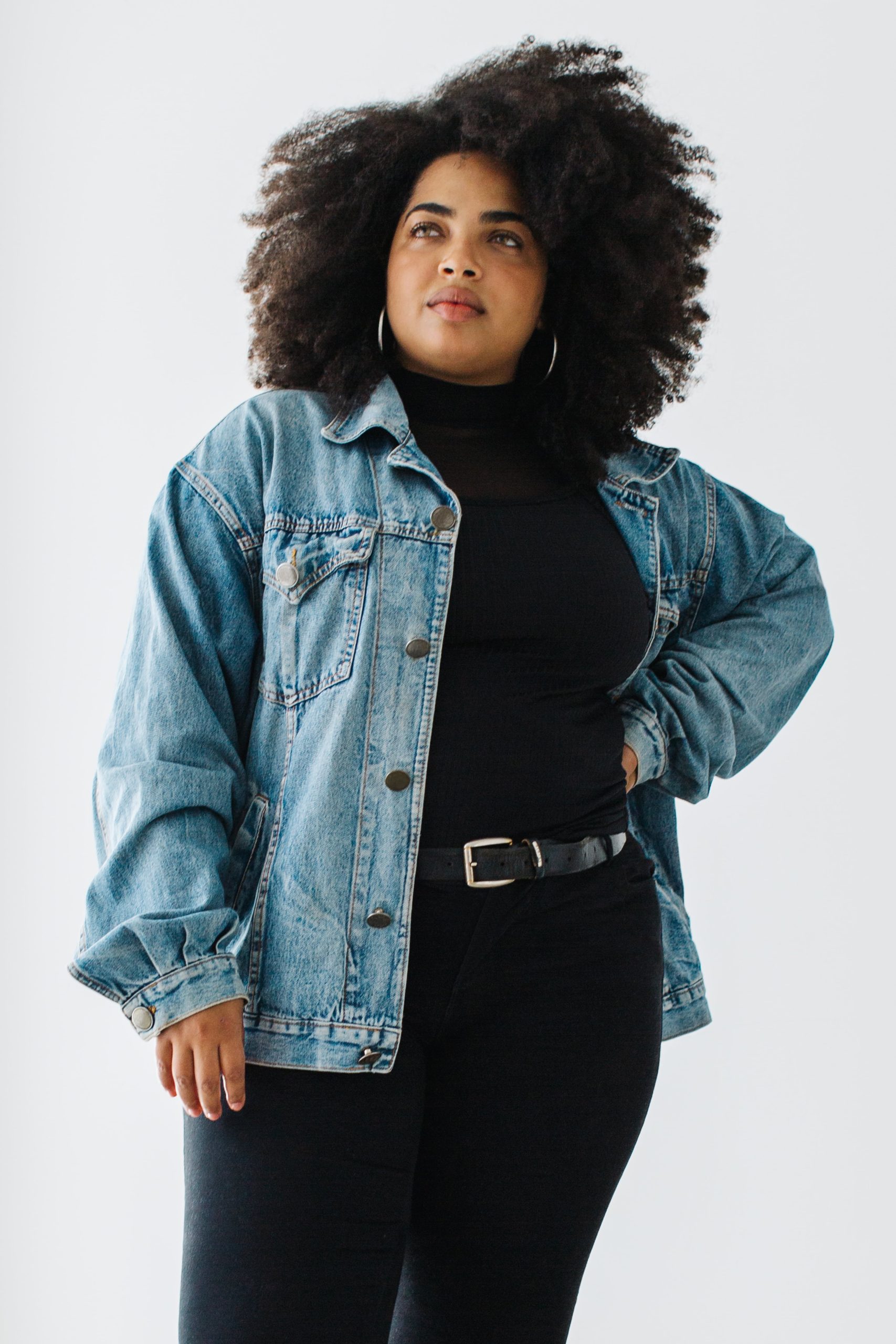 Oversized Denim Jacket Over Black Turtleneck for Urban Chic — Winter Outfits for Plus Size Women