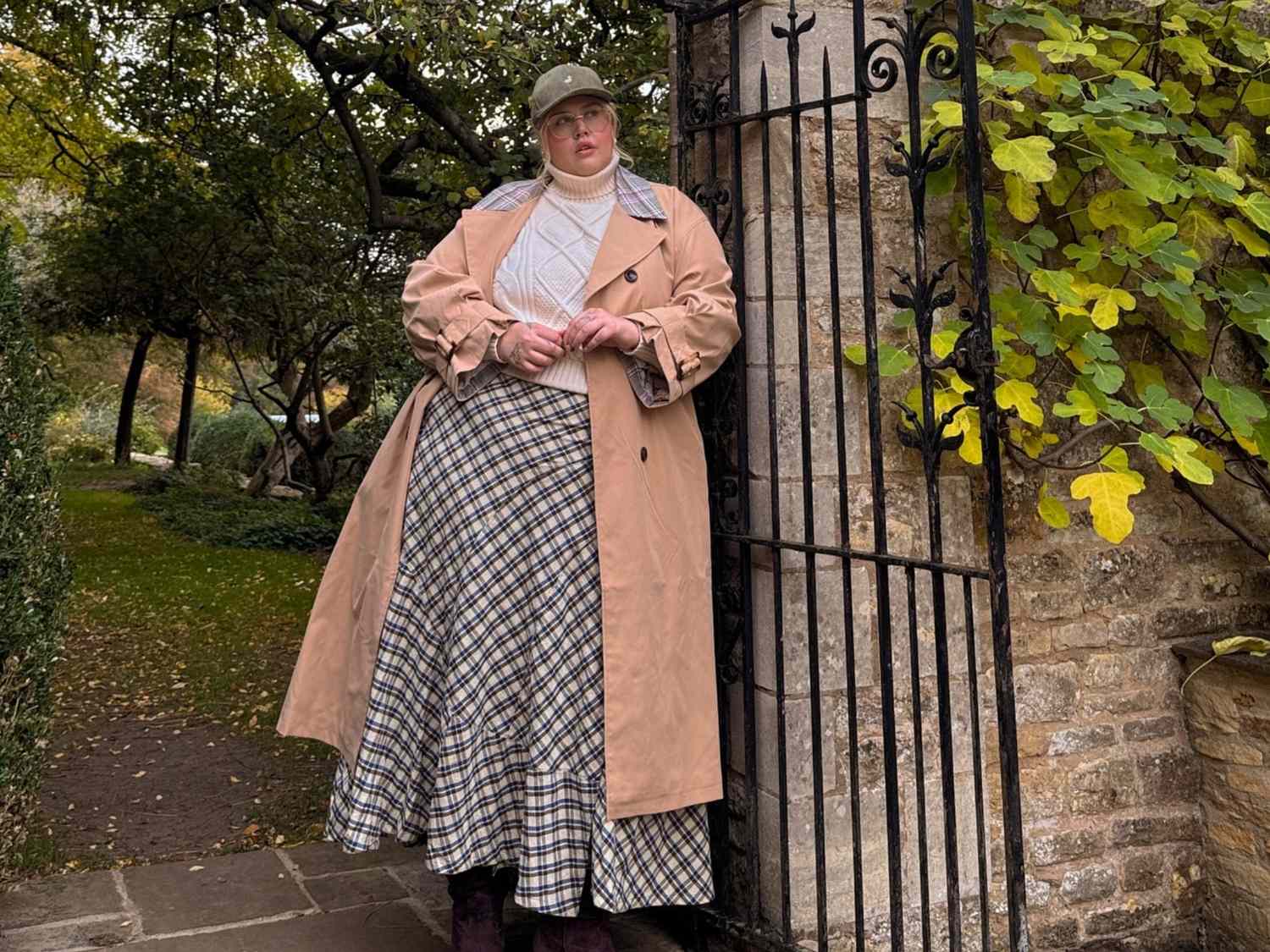 Plaid Midi Skirt with Trench Coat and Cable-Knit Sweater — Winter Skirt Outfits