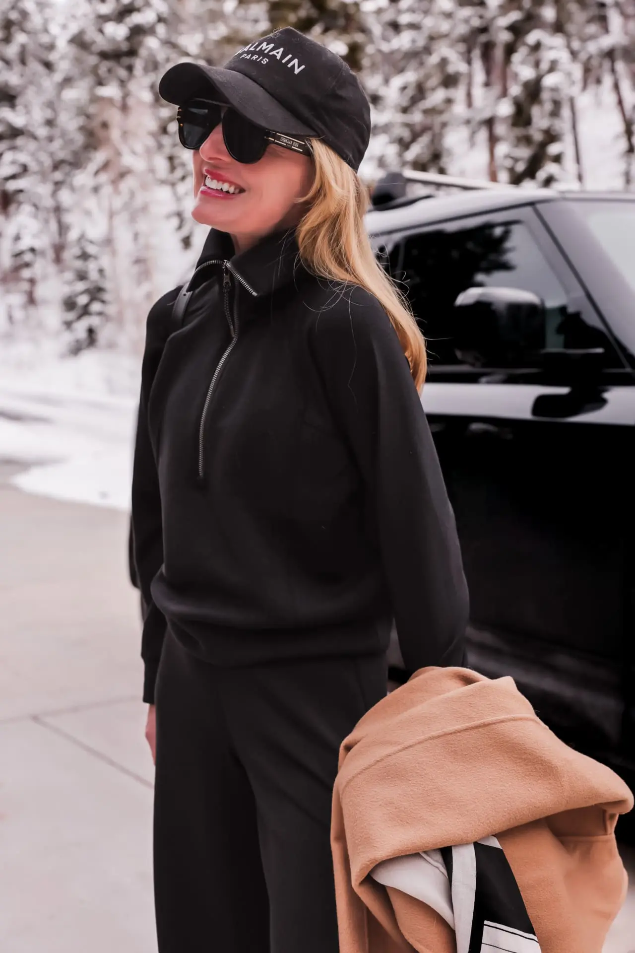 Athleisure Travel: Half-Zip Sweatshirt with Draped Coat Athleisure Travel: Half-Zip Sweatshirt with Draped Coat — Winter Travel Outfits