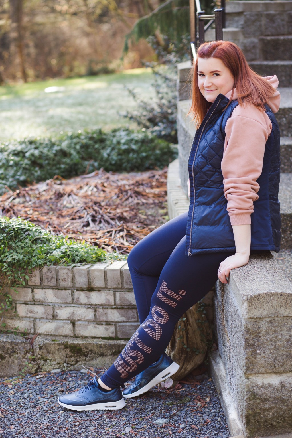 Pink Hoodie and Quilted Vest for Layered Warmth — Winter Workout Outfits