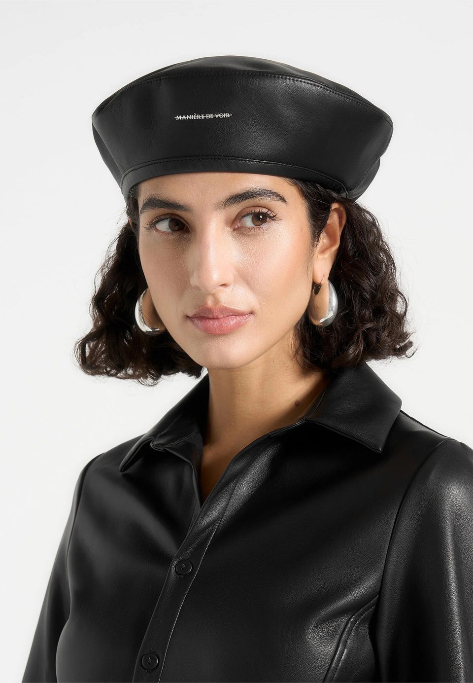 Monochromatic Leather: Black Beret with Matching Shirt — Beret Outfits