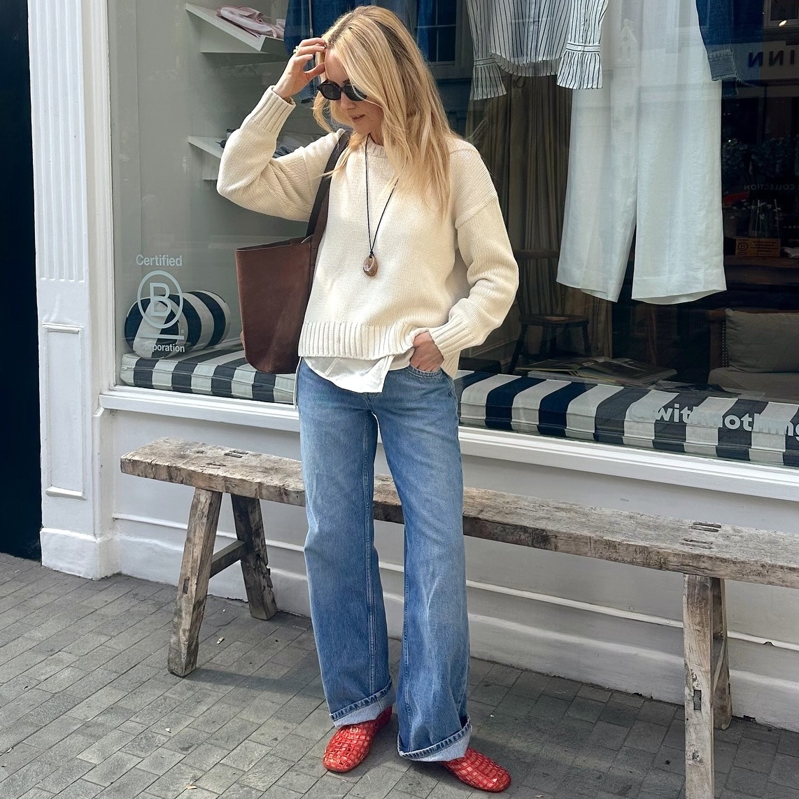 Layered Cream Sweater with Wide-Leg Jeans and Red Flats — Oversized Sweater Outfits