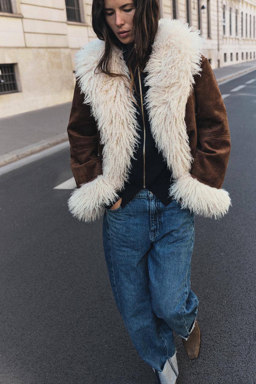 Brown Shearling Jacket with Cream Trim, Black Top, and Jeans Brown Shearling Jacket with Cream Trim, Black Top, and Jeans — Shearling Coat Outfits