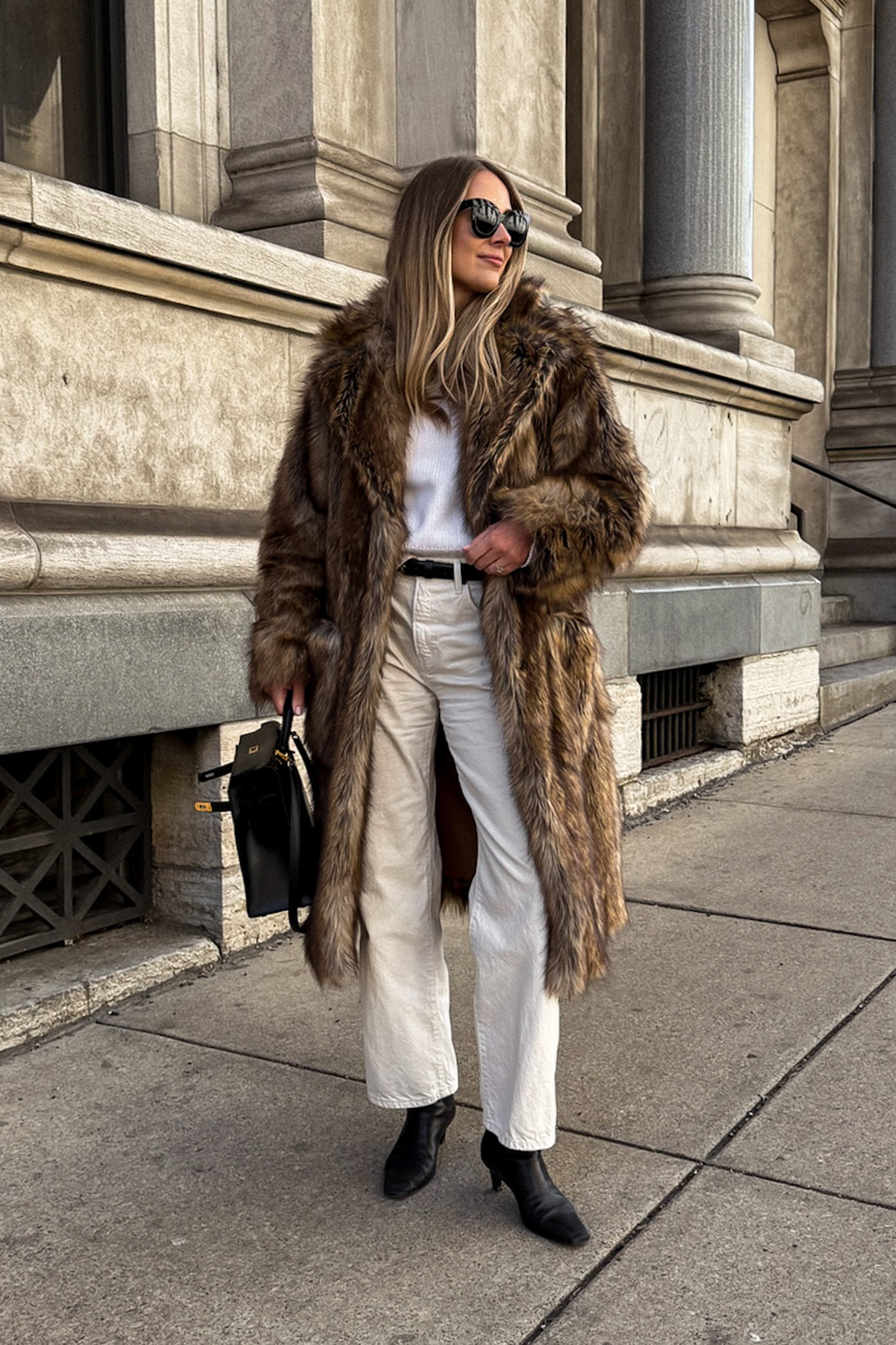 Dramatic Faux Fur Coat Over Knitwear and Trousers — Nashville Winter Outfits