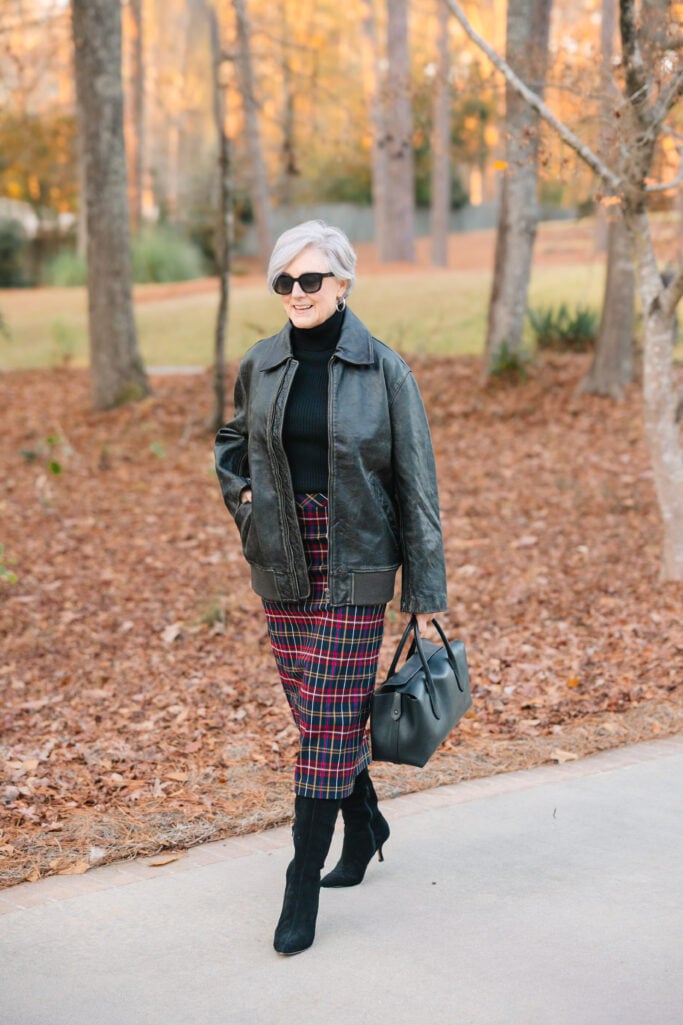 Edgy Leather Jacket with a Vibrant Plaid Skirt — Winter Outfits for Women Over 60