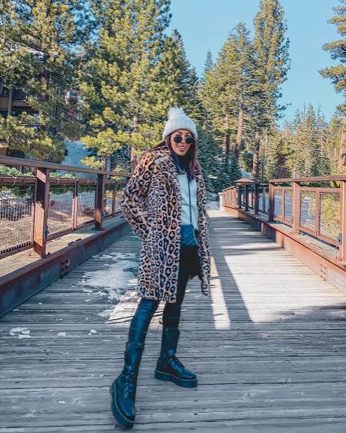 Statement Outerwear: Black Lace-Up Boots with a Leopard Print Coat — Black Boots Outfits