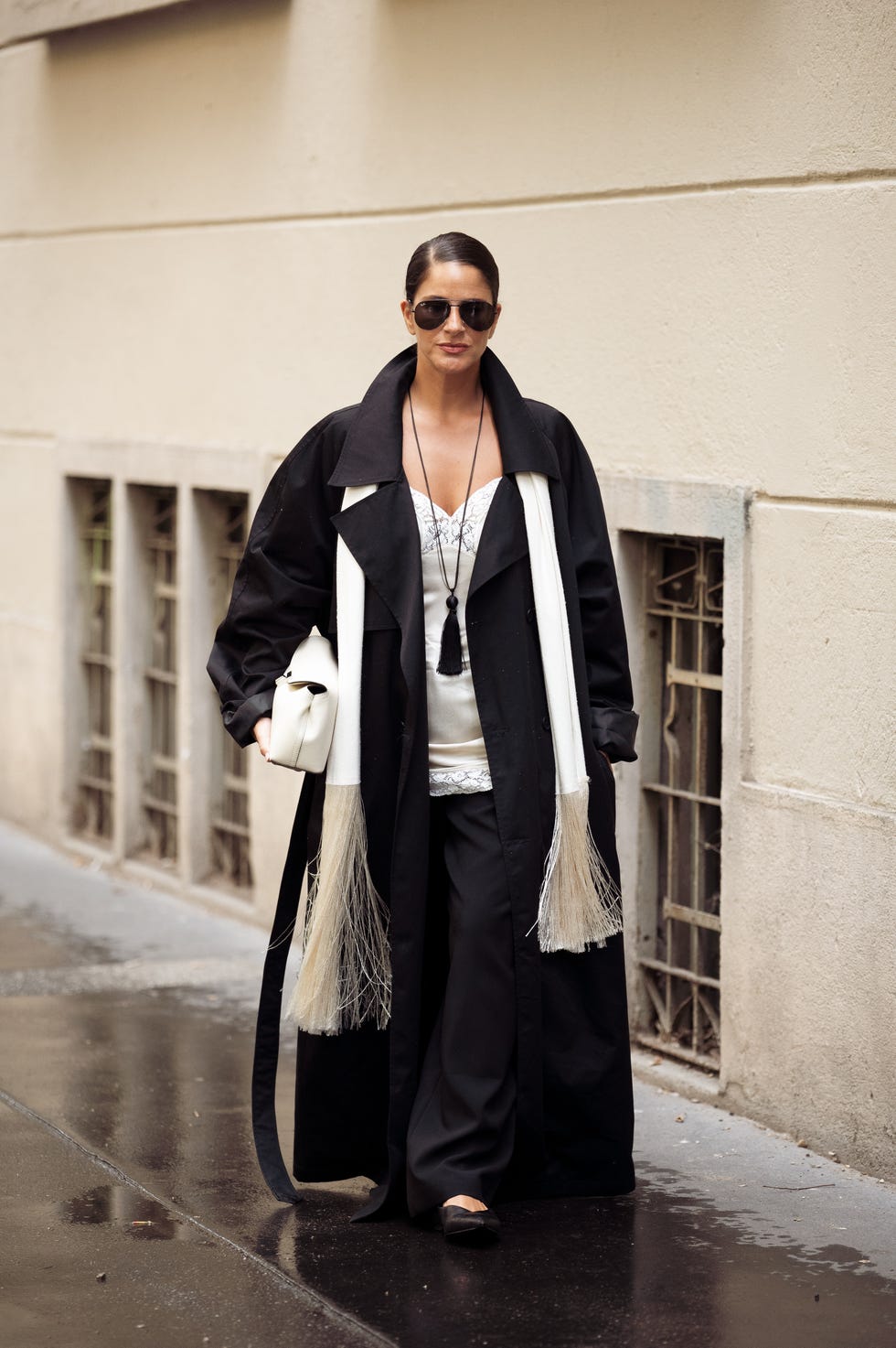 Black Trench Coat with White Scarf and Wide-Leg Trousers Black Trench Coat with White Scarf and Wide-Leg Trousers — Black Coat Outfits