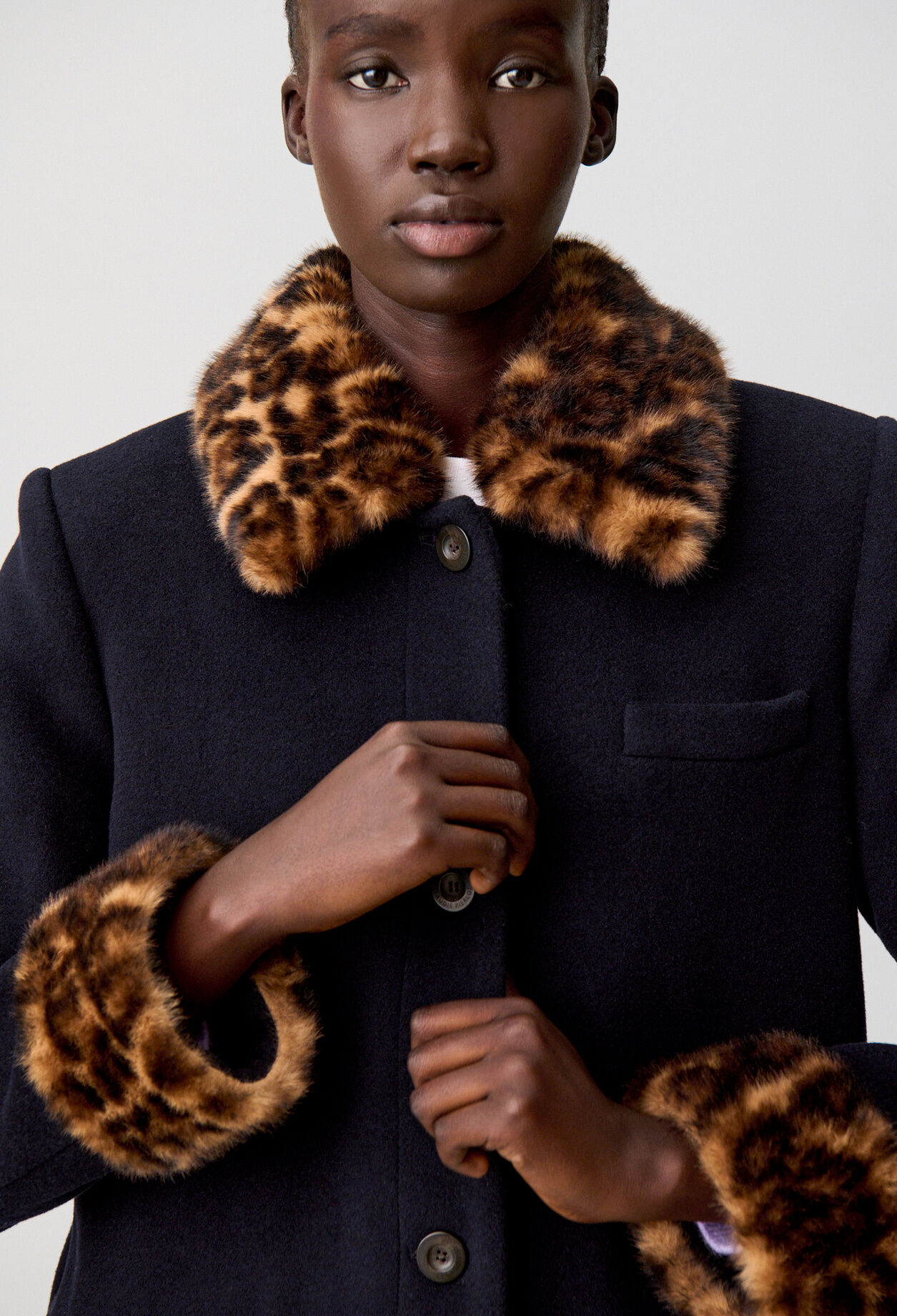 Leopard Print Trim on a Navy Wool Coat Leopard Print Trim on a Navy Wool Coat — Leopard Coat Outfits