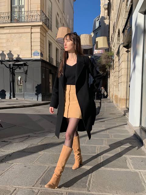 Bold Mustard Mini Skirt Paired with a Black Coat — Paris Winter Outfits