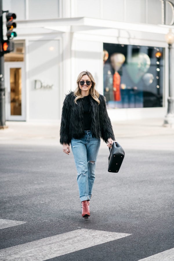 Edgy Contrast: Faux Fur Jacket with Ripped Jeans and Bright Boots — Chicago Winter Outfits