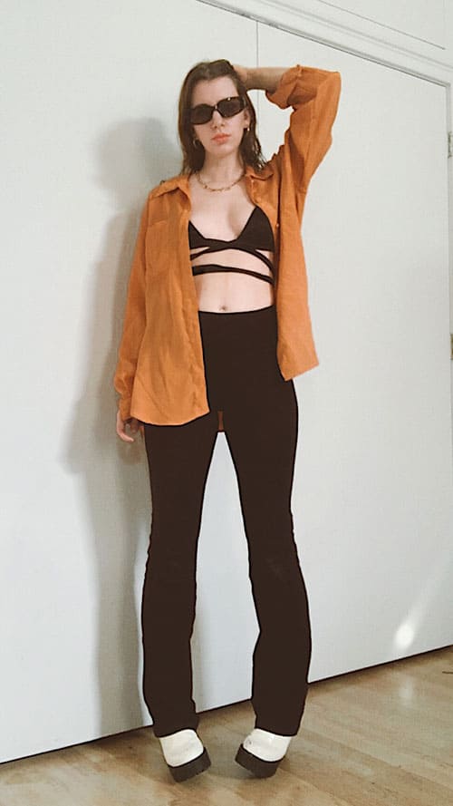 Bold Statement: Black Flare Leggings with Orange Shirt Bold Statement: Black Flare Leggings with Orange Shirt — Flare Leggings Outfits